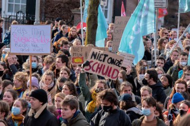 People Walking At The Niet Mijn Schuld Demonstration At Amsterdam The Netherlands 5-2-2022