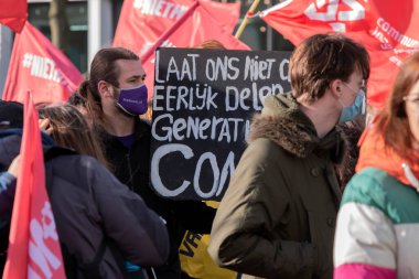 Protester With Mouth Cap Volt At The Niet Mijn Schuld Demonstration At Amsterdam The Netherlands 5-2-2022