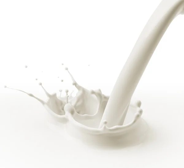 Pouring milk — Stock Photo, Image