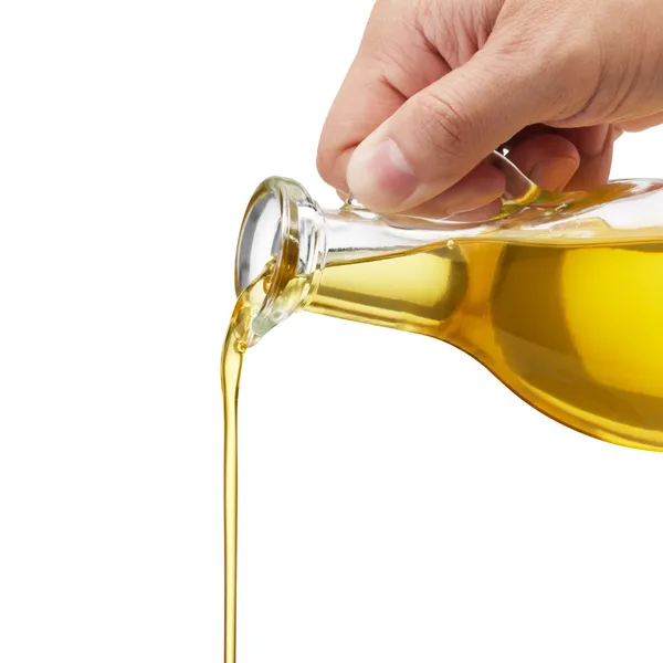 Pouring oil — Stock Photo, Image