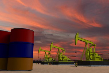 Güneş batarken hava bulutlu ve petrol varillerinin üzerinde ARMENIA bayrağı asılı.