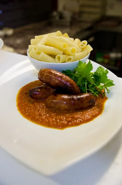 Sausages and pasta — Stock Photo, Image