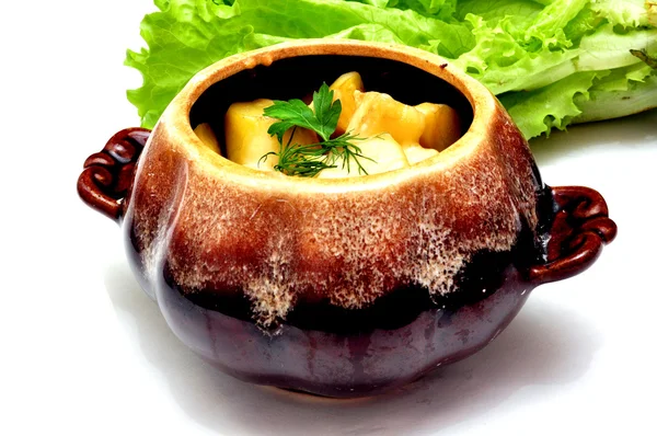 Meat and potatoes baked in a pot — Stock Photo, Image