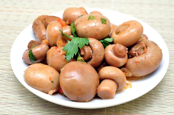 Marinated mushrooms on a plate — Stock Photo, Image