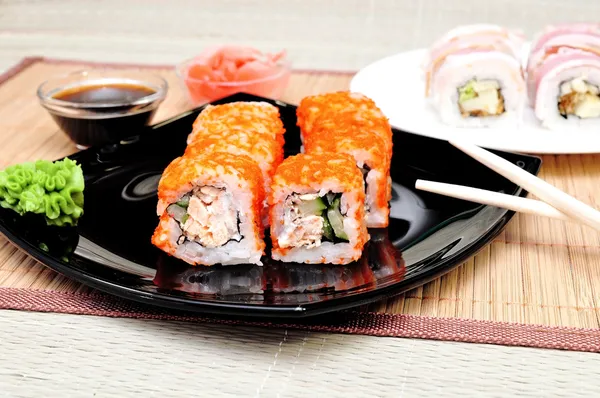 Japanese rolls with masago caviar — Stock Photo, Image