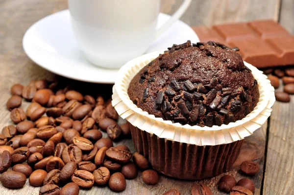 Tazza di caffè con muffin e cioccolato — Foto Stock