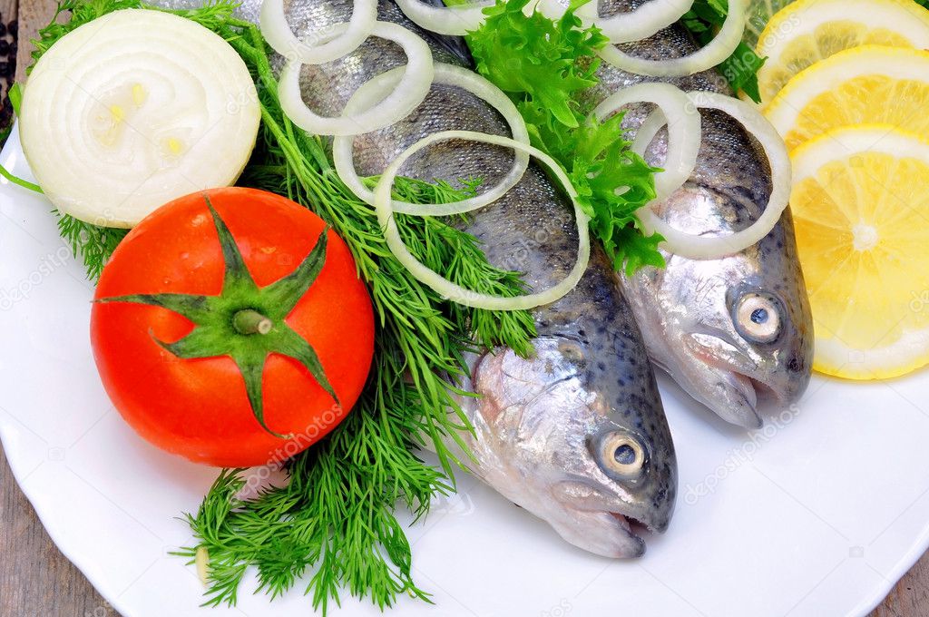 Rainbow trout with lemon and fresh vegetables