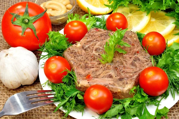 Jellied meat with fresh herbs — Stock Photo, Image