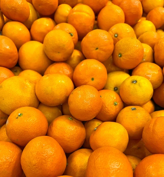 Achtergrond van verse smakelijke mandarijn — Stockfoto