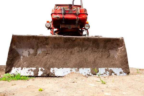 Traktor dengan pisau di tanah — Stok Foto