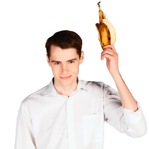 Νεαρός άνδρας στο άσπρο πουκάμισο ρίψη μπανάνα φλούδες — Φωτογραφία Αρχείου