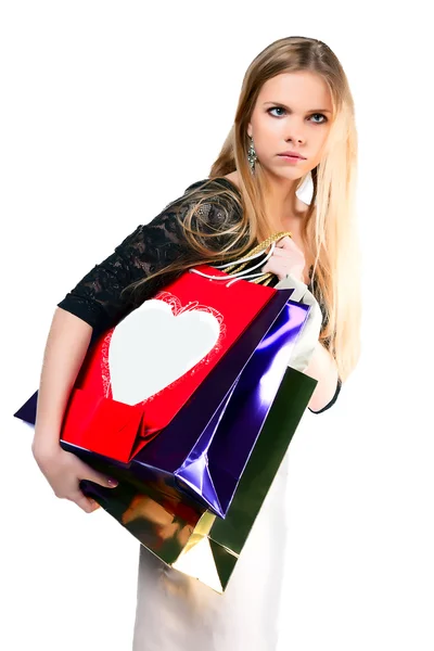 Девушка с бумажными пакетами для покупок — стоковое фото