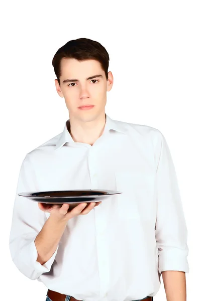 Junger Mann mit leerem Teller isoliert auf weißem Hintergrund — Stockfoto