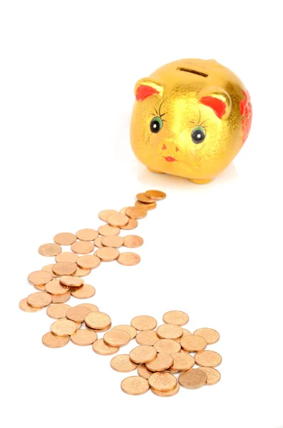 Piggy bank en munt — Stockfoto