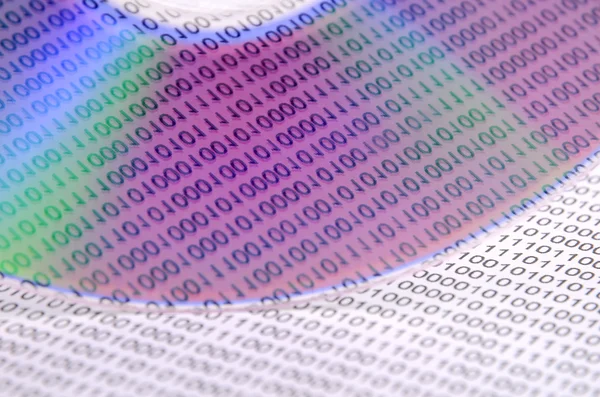 Binary code and DVD — Stock Photo, Image