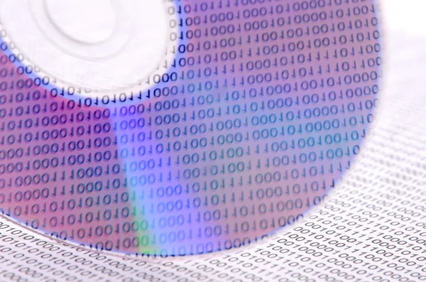 Binary code and DVD — Stock Photo, Image