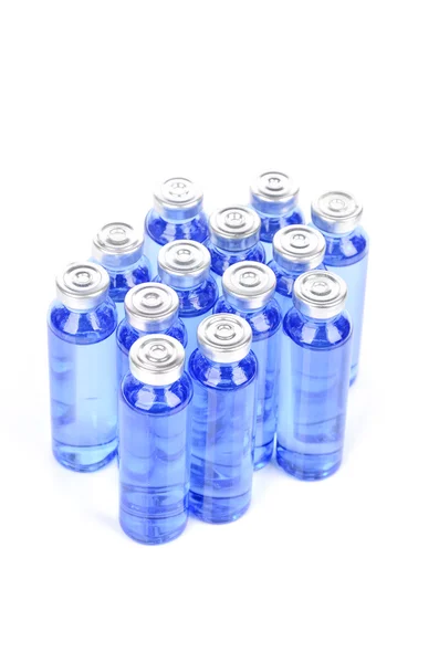 Flaskor på vit bakgrund — Stockfoto