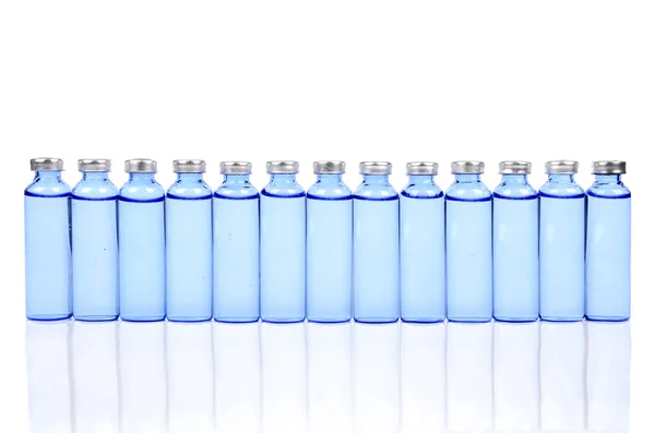 Flaskor på vit bakgrund — Stockfoto