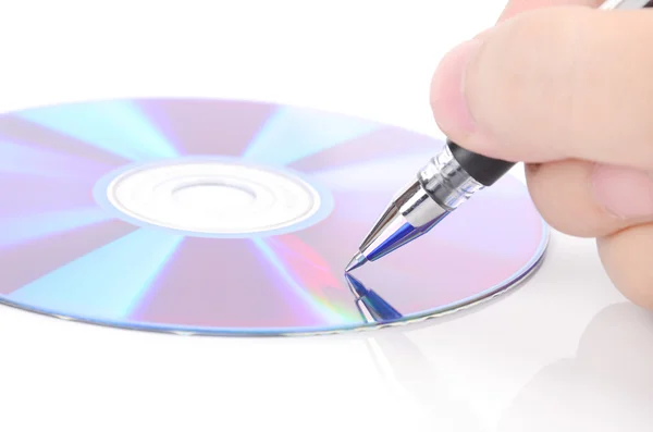 DVD e penna su sfondo bianco — Foto Stock