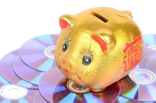 Piggy bank e DVD sobre fundo branco — Fotografia de Stock