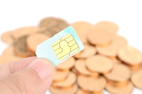 Coin and sim card — Stock Photo, Image