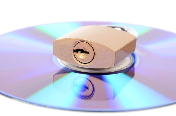 DVD and padlock on white background — Stock Photo, Image