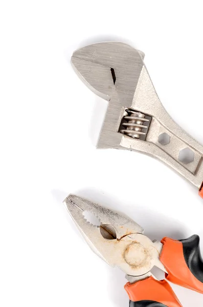 Spanner and pliers on white background — Stock Photo, Image