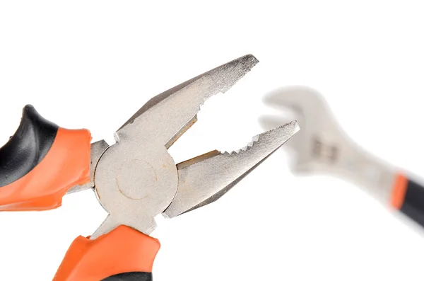 Spanner and pliers on white background — Stock Photo, Image