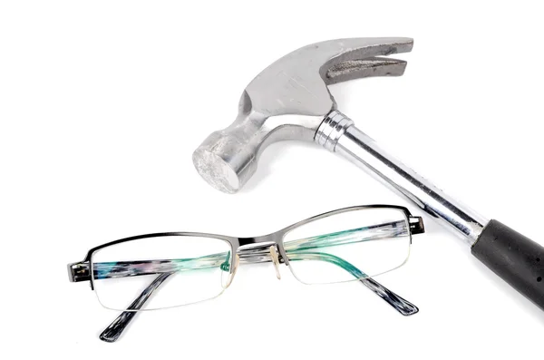 Hammer and glasses on white background — Stock Photo, Image