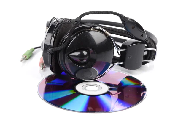 DVD and headphone on white background — Stock Photo, Image