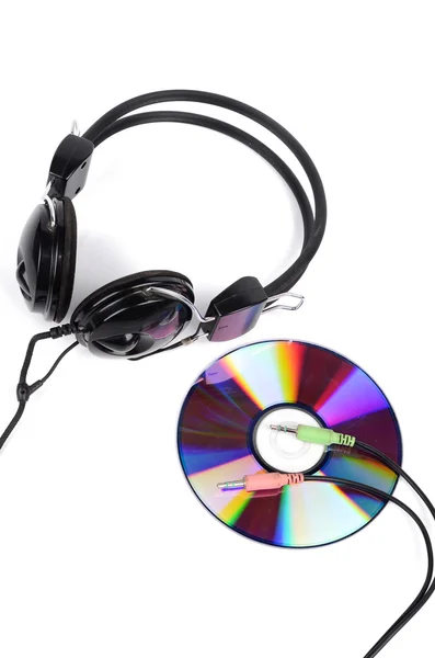 DVD and headphone on white background — Stock Photo, Image