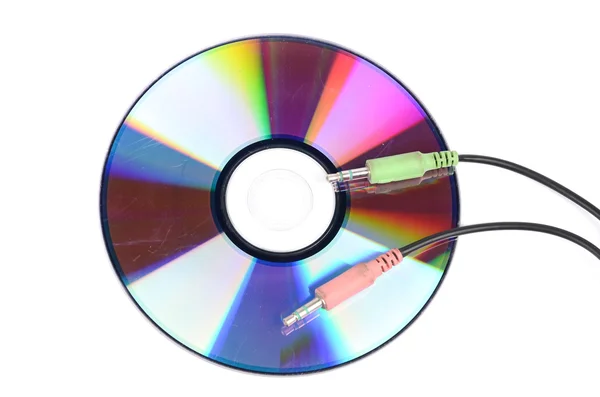 DVD ve beyaz arka plan üzerinde fiş — Stok fotoğraf