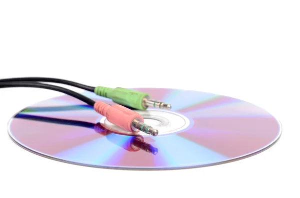 DVD and plug on white background — Stock Photo, Image