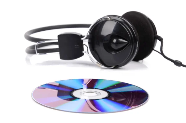 DVD and headphone on white background — Stock Photo, Image