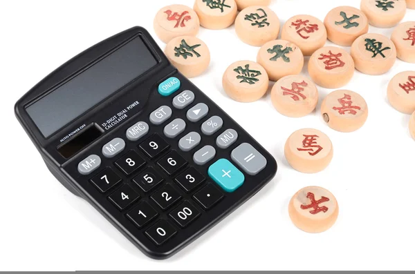 Calculator and xiangqi — Stock Photo, Image