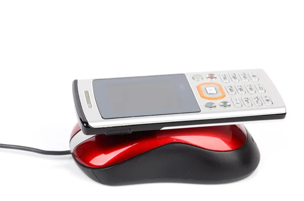 Telefone celular e mouse — Fotografia de Stock