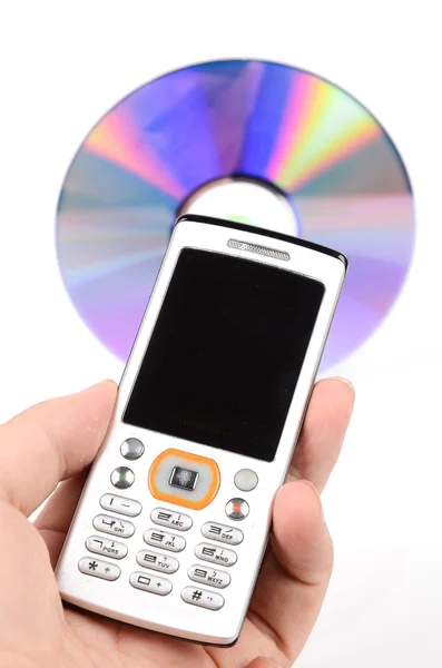 Telefone celular e DVD — Fotografia de Stock
