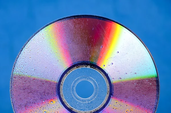 DVD на синем фоне — стоковое фото