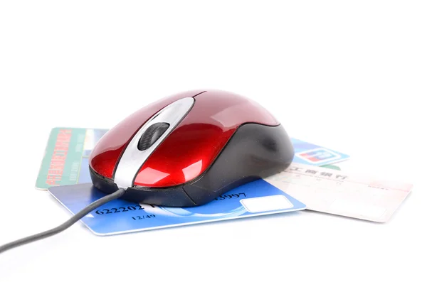 Компьютерная мышь и кредитная карта — стоковое фото
