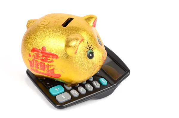 Banco porquinho e calculadora — Fotografia de Stock