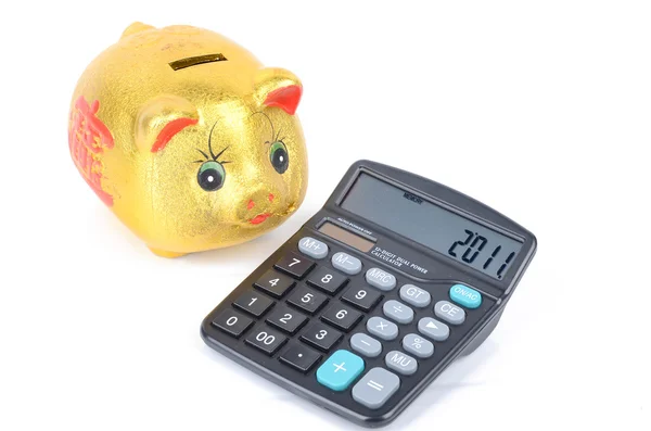 Piggy bank and calculator — Stock Photo, Image