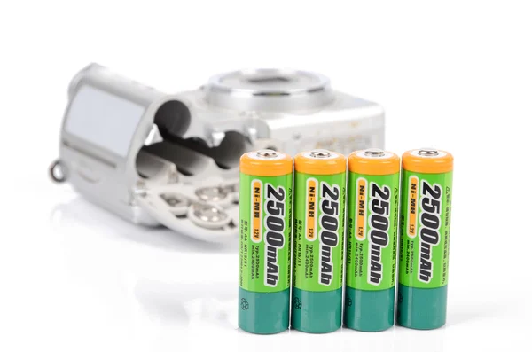 Digital camera and battery — Stock Photo, Image