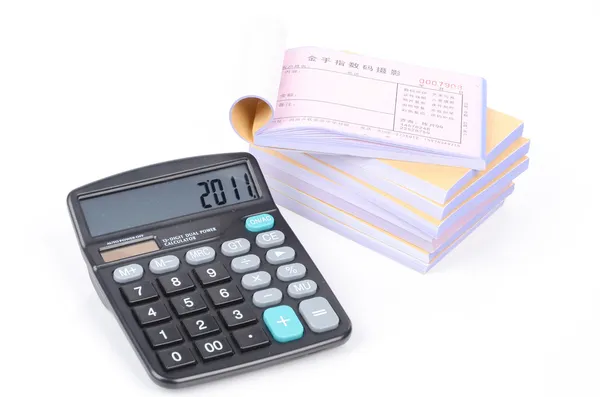 Notebook and calculator Stock Picture