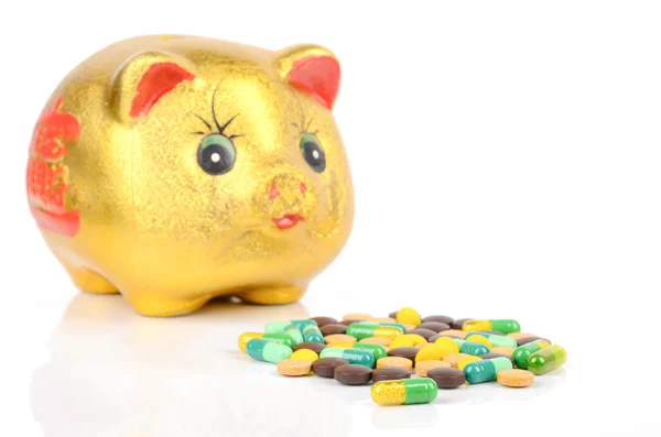 Medicine and piggy bank — Stock Photo, Image