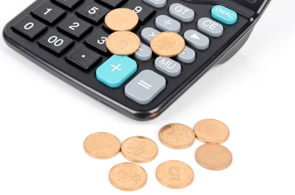 Miniräknare och mynt — Stockfoto