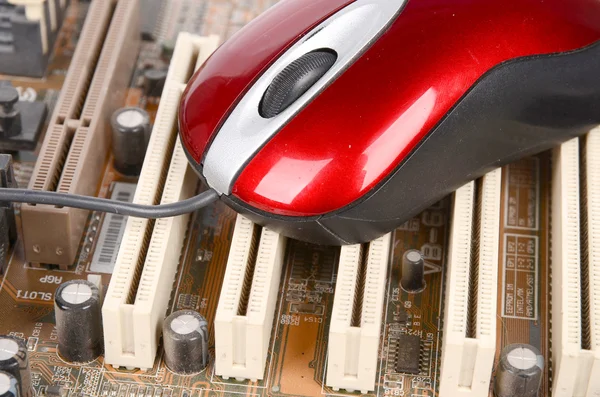Computer mainboard and mouse — Stock Photo, Image