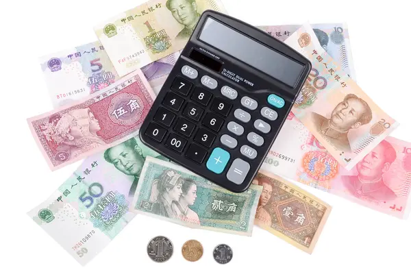 Calculator and chinese currency — Stock Photo, Image