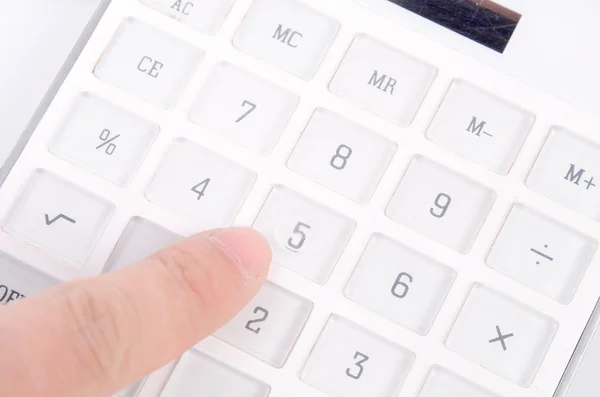 Calculator and finger — Stock Photo, Image