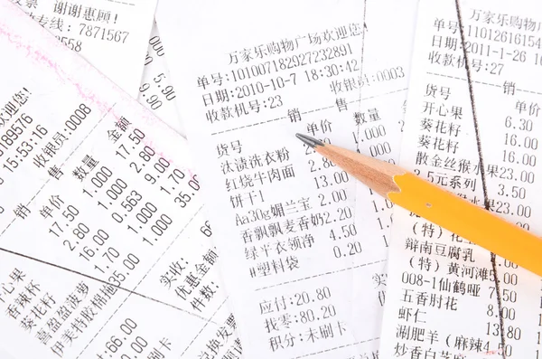 Pencil and receipt — Stock Photo, Image