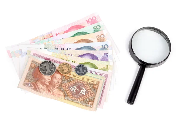 Magnifier and chinese currency — Stock Photo, Image